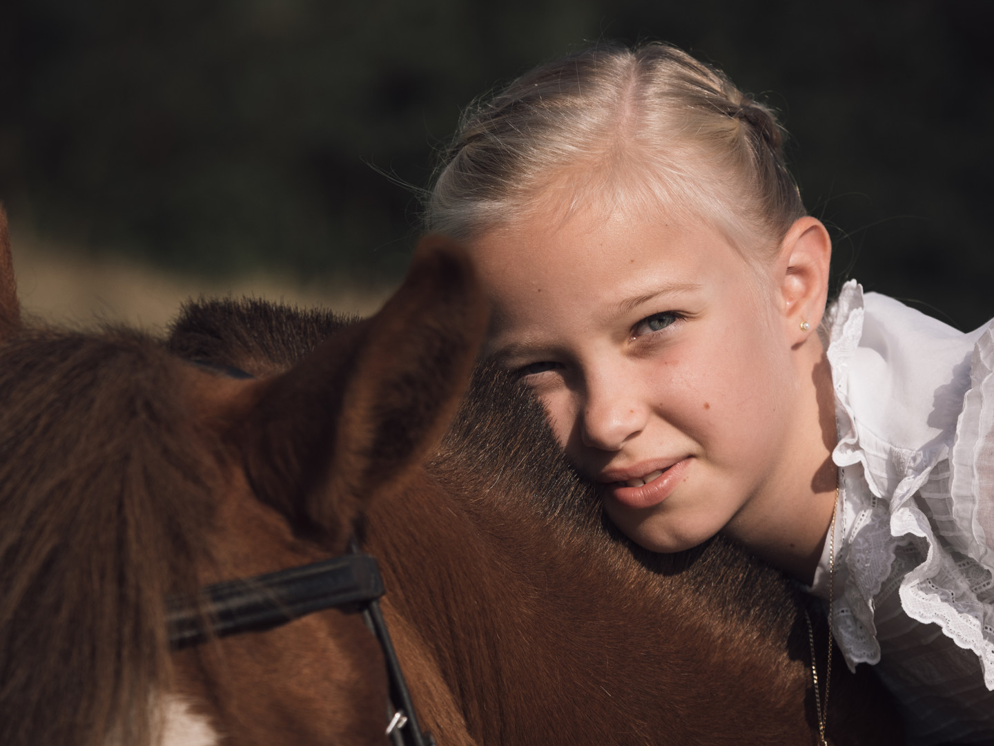 Sesión de comunión niña y caballo